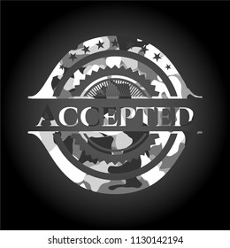 Accepted on grey camouflage texture
