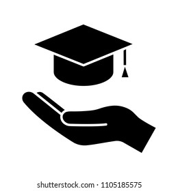 Accessible Or Free Education Glyph Icon. Silhouette Symbol. Open Hand With Graduation Cap. Getting Diploma. Negative Space. Vector Isolated Illustration