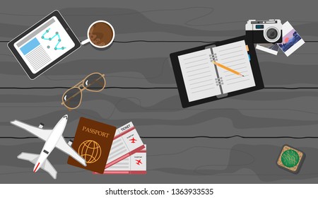Accessories traveler's passport, glasses, smart phone devices, on a wooden floor in the ready to travel. 