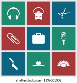 Accessory icon. collection of 9 accessory filled icons such as bag, headphones, hat, case, bllade razor, mirror, paper clip. editable accessory icons for web and mobile.