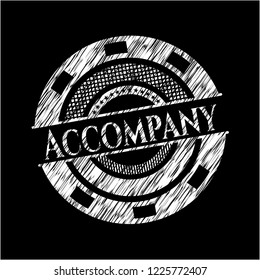 Accompany chalkboard emblem written on a blackboard
