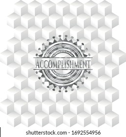 Accomplishment realistic grey emblem with geometric cube white background. 