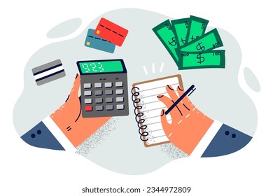 Accountant desktop with calculator in hands and notepad for recording expenses or income near cash with credit cards. Accountant calculates budget and amount of taxes paid after receiving wages