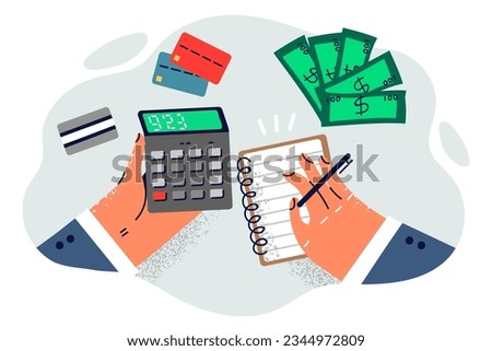 Accountant desktop with calculator in hands and notepad for recording expenses or income near cash with credit cards. Accountant calculates budget and amount of taxes paid after receiving wages