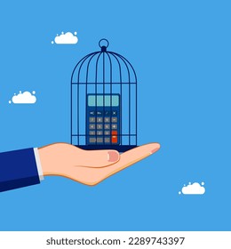 Accounting and financial control. Calculator locked in a birdcage. concept of finance and investment