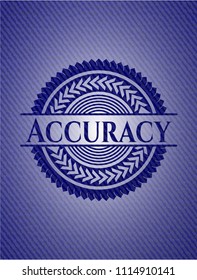  Accuracy badgeAccuracy badge with denim background with jean texture