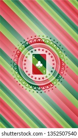 ace of clover icon inside christmas emblem.