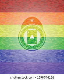 ace of clover icon inside emblem on mosaic background with the colors of the LGBT flag