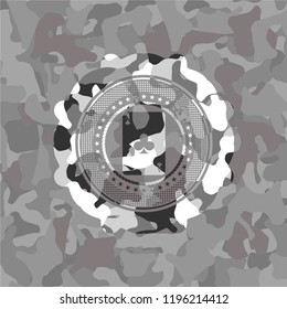 ace of clover icon inside grey camouflaged emblem