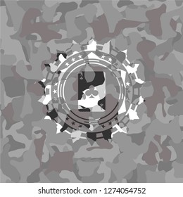 ace of clover icon inside grey camouflage emblem