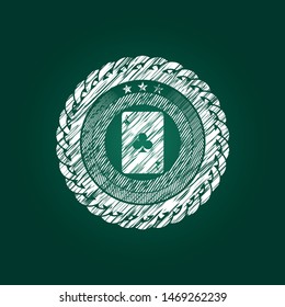 ace of clover icon on chalkboard