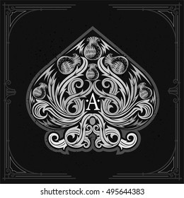 Ace of spades from thistle pattern inside. White on blackboard