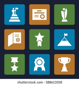 achievement icons set. Set of 9 achievement filled icons such as trophy, man at the top of the mountain with flag, flag on mountain, medal with star, diploma