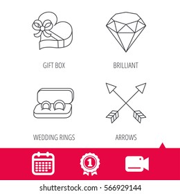 Achievement and video cam signs. Brilliant, gift box and wedding rings icons. Arrows linear signs. Calendar icon. Vector