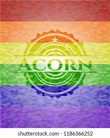 Acorn emblem on mosaic background with the colors of the LGBT flag