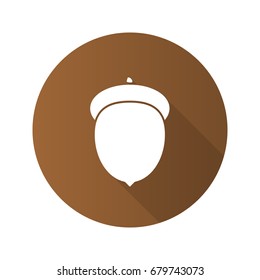 Acorn flat design long shadow glyph icon. Oak fruit. Vector silhouette illustration
