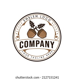 Acorn logo design decorated with ornamental circles.