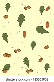 Acorns and leaves on a yellow background