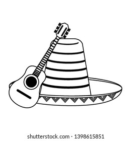 Acoustic guitar and mexican hat in black and white