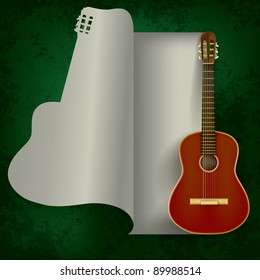 acoustic guitar on abstract grunge green background