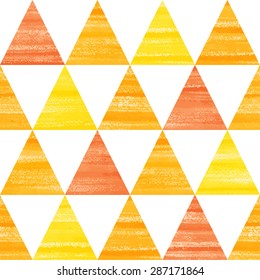 Acrylic yellow, orange and red triangles seamless vector pattern. Brush drawn geometrical background.
