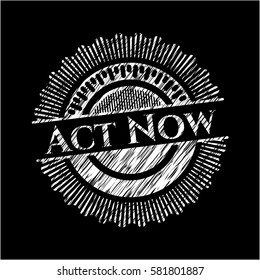Act Now chalk emblem written on a blackboard