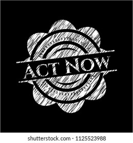 Act Now on chalkboard