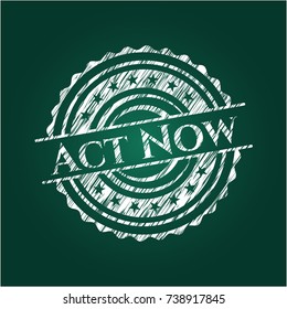Act Now written on a blackboard