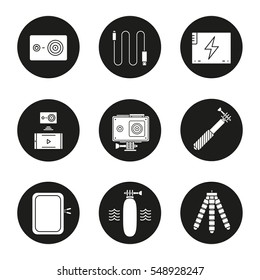 Action camera icons set. Sport cam, usb cable, battery, phone connection, waterproof case, selfie monopod stick, floating grip, box, tripod. Vector white silhouettes illustrations in black circles