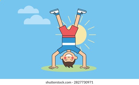 Active young boy doing a perfect handstand on the green grass under a bright shining sun and blue sky.