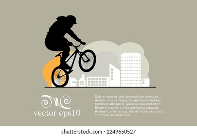 Active young man doing tricks on a bicycle, extreme sport concept.