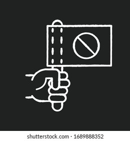 Activist chalk white icon on black background. Hand holding flag with stop sign. Protester rally. Demonstration in digital marketing. Strike action. Isolated vector chalkboard illustration