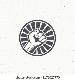 Activist Rebellion Fist Symbol. Abstract Vector Riot Label, Emblem or Logo Template. Hand with Rays in a Circle Silhouette with Shabby Textures. Isolated.