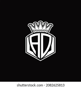 Monograma de logotipo AD con forma de emblema de lujo y plantilla de diseño de corona sobre fondo negro