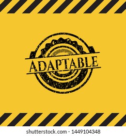 Adaptable black grunge emblem inside yellow warning sign. Vector Illustration. Detailed.
