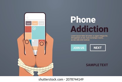 adictas manos humanas atadas con cuerda usando el concepto de adicción digital en redes sociales de smartphone