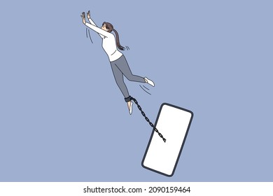 Addiction to internet and gadgets concept. Young woman trying to fly away from smartphone connected with chain on leg like slave vector illustration 