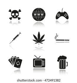 Addictions and bad habits drop shadow black icons set. Skull and crossbones, www globe symbol, gamepad, syringe, marijuana leaf, cigarette, cards deck, tv, beer mug. Isolated vector illustrations