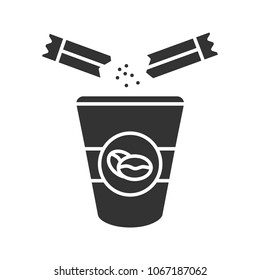 Adding sugar to coffee glyph icon. Disposable coffee cup and sugar sachet. Silhouette symbol. Negative space. Vector isolated illustration
