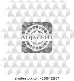 Adjacent grey badge with geometric cube white background