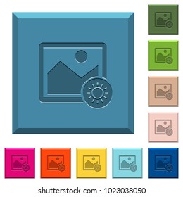Adjust image brightness engraved icons on edged square buttons in various trendy colors