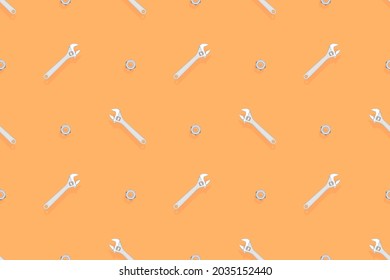 Llave de metal ajustable sin soldadura. Fondo de una llave metálica y una tuerca. 