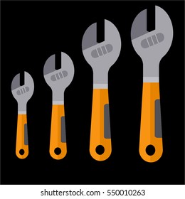Adjustable wrenches with yellow handles on black background
