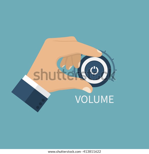 Adjusting volume. Hand on volume control button.\
Sound control knob.\
Turning.