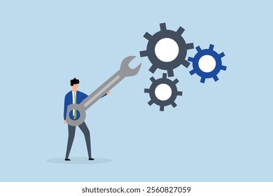 Adjustment and optimization for business improvement, entrepreneur grasping wrench to modify gear cogwheels configuration.