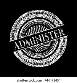 Administer chalkboard emblem on black board