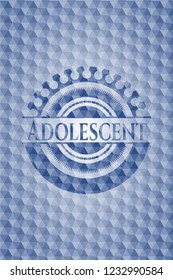 Adolescent blue badge with geometric pattern.