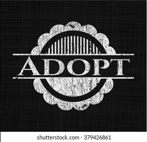 Adopt chalkboard emblem written on a blackboard