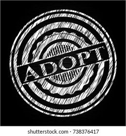 Adopt chalkboard emblem written on a blackboard