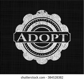 Adopt written on a chalkboard
